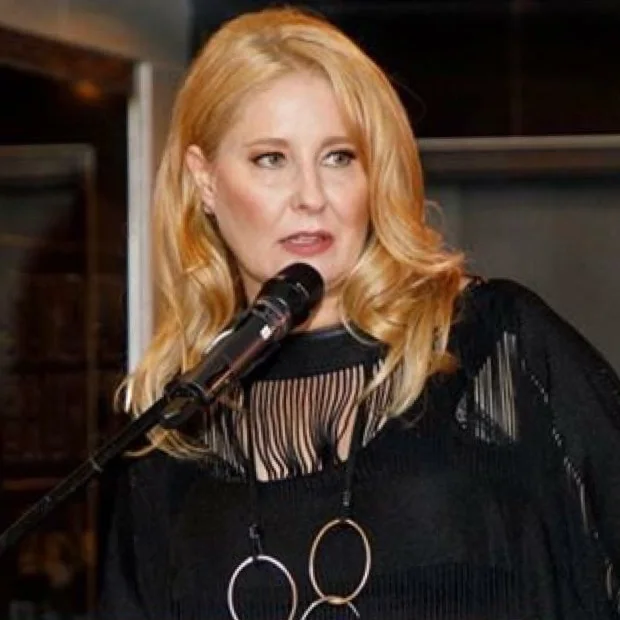 Krista speaking at an event